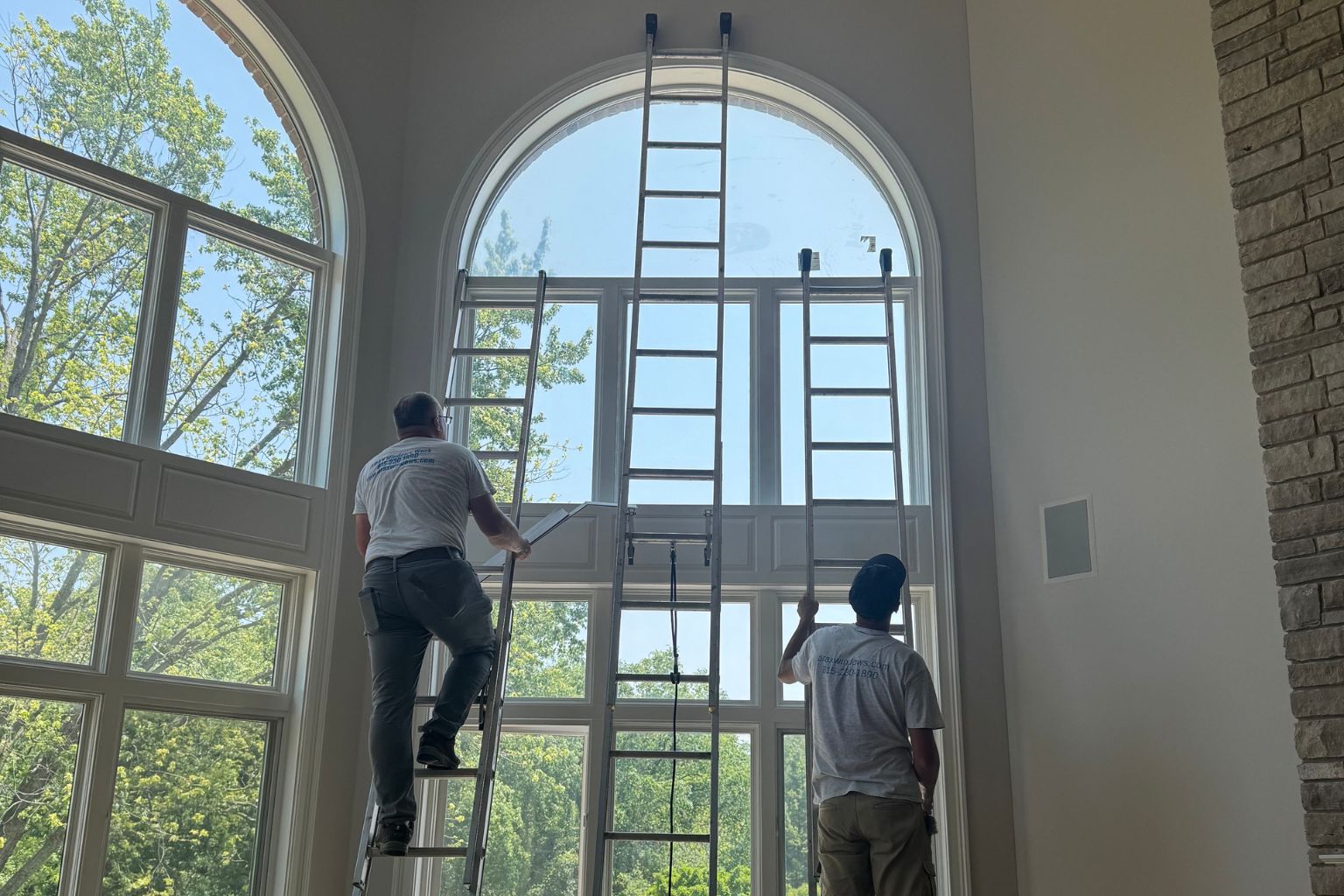 Arax Window Repair Experts working on the windows in a house